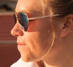 Tifosi Optics Shwae Aviator Sunglasses -Golf Clubs Shop woman wearing shwaegold 553x227 1